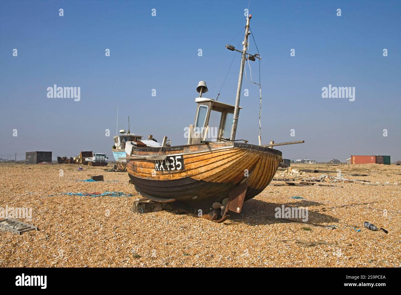 wooden fishing boats on the shingle beach at dungeness on the kent ...