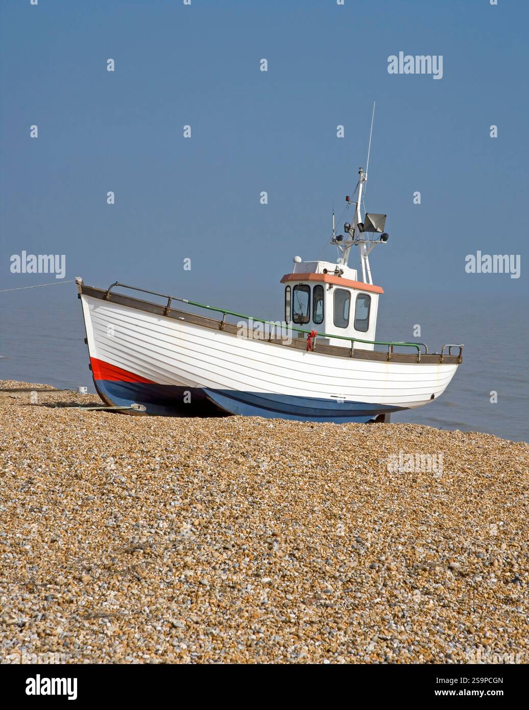 wooden fishing boats on the shingle beach at dungeness on the kent ...