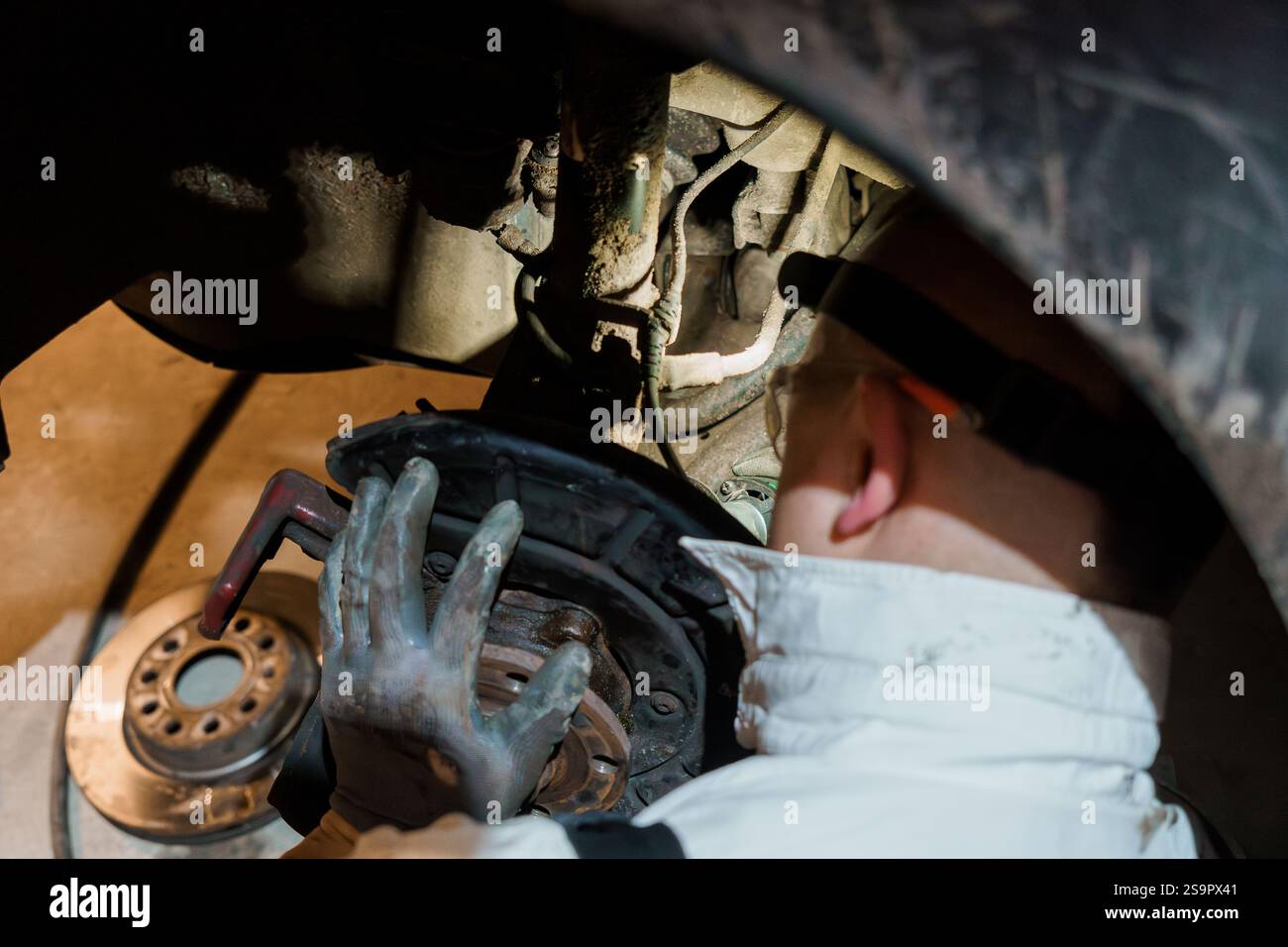 Detailed Mechanics at Work on Vehicle Brake System Stock Photo - Alamy