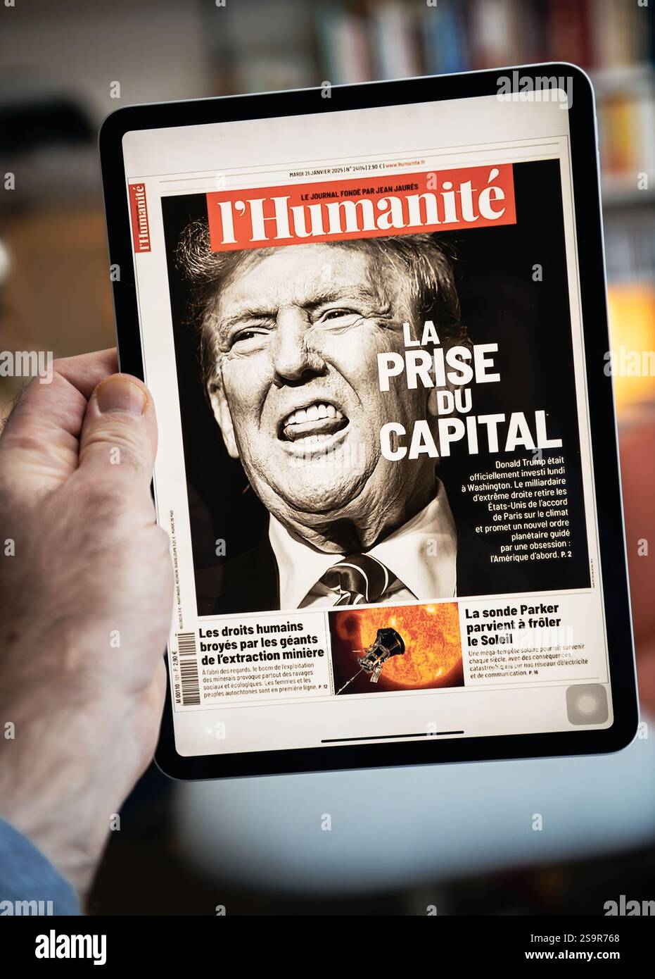 Trump Ipad Paris, France - Jan 21, 2025: The l'Humanite newspaper cover displayed ...