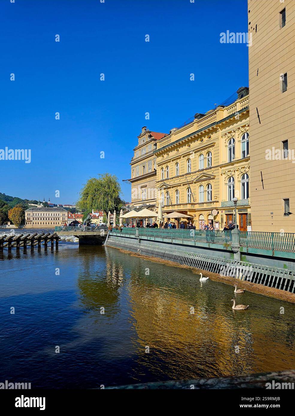Buildings and a cafe at the moldova in Prague - Smartphone Captured Stock Image