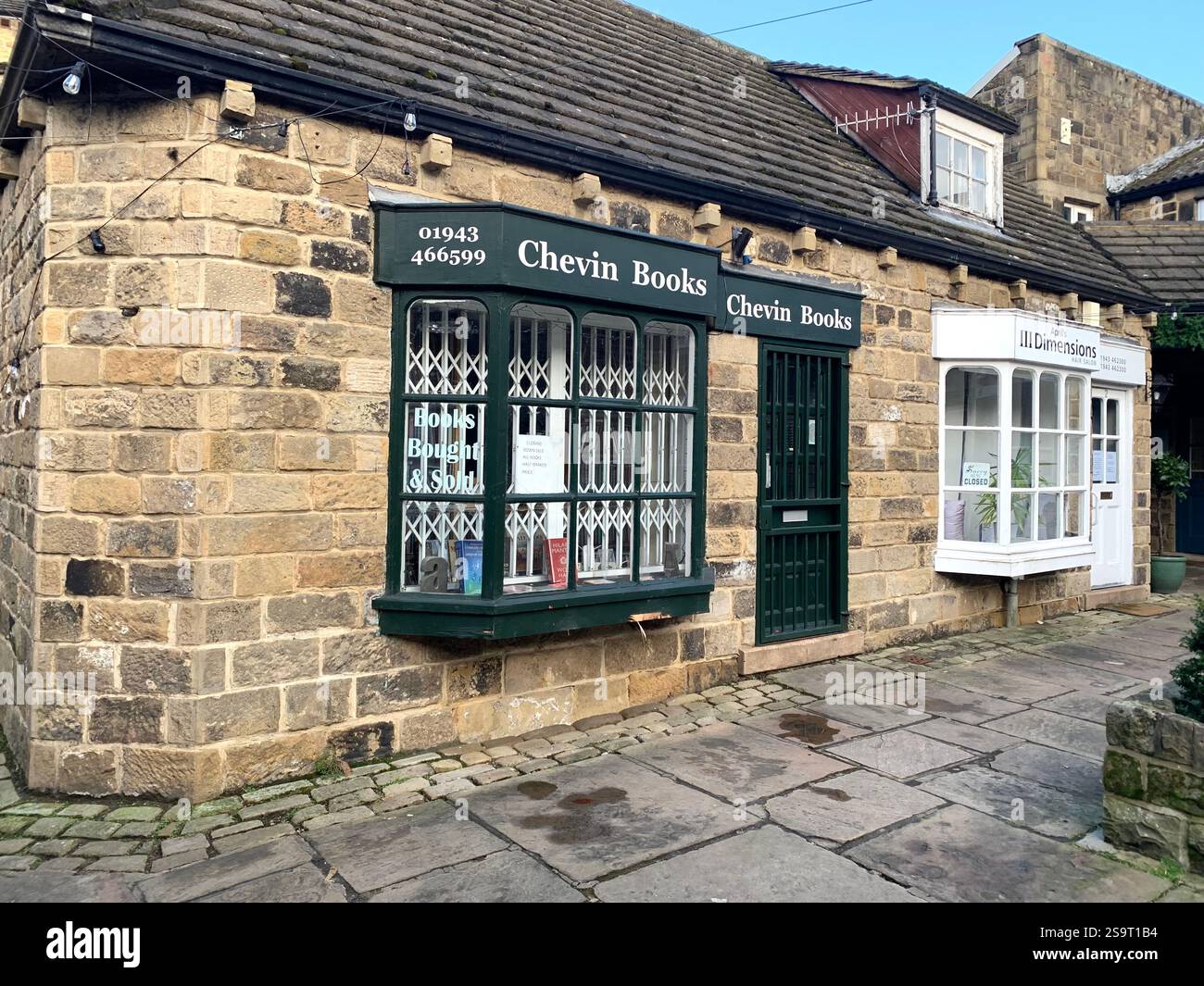 Otley Yorkshire town village place town street streets sign signs shop shops shopping shoppers life living  local pub Cromwell army history life - Smartphone Captured Stock Image