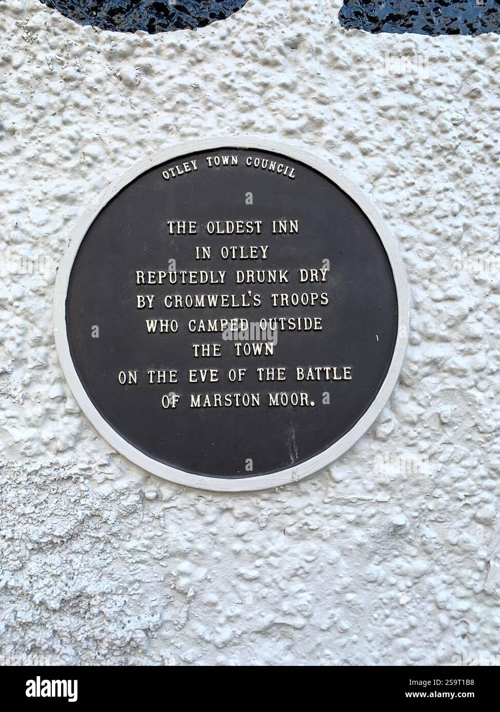 Otley Yorkshire town village place town street streets sign signs shop shops shopping shoppers life living  local pub Cromwell army history life - Smartphone Captured Stock Image