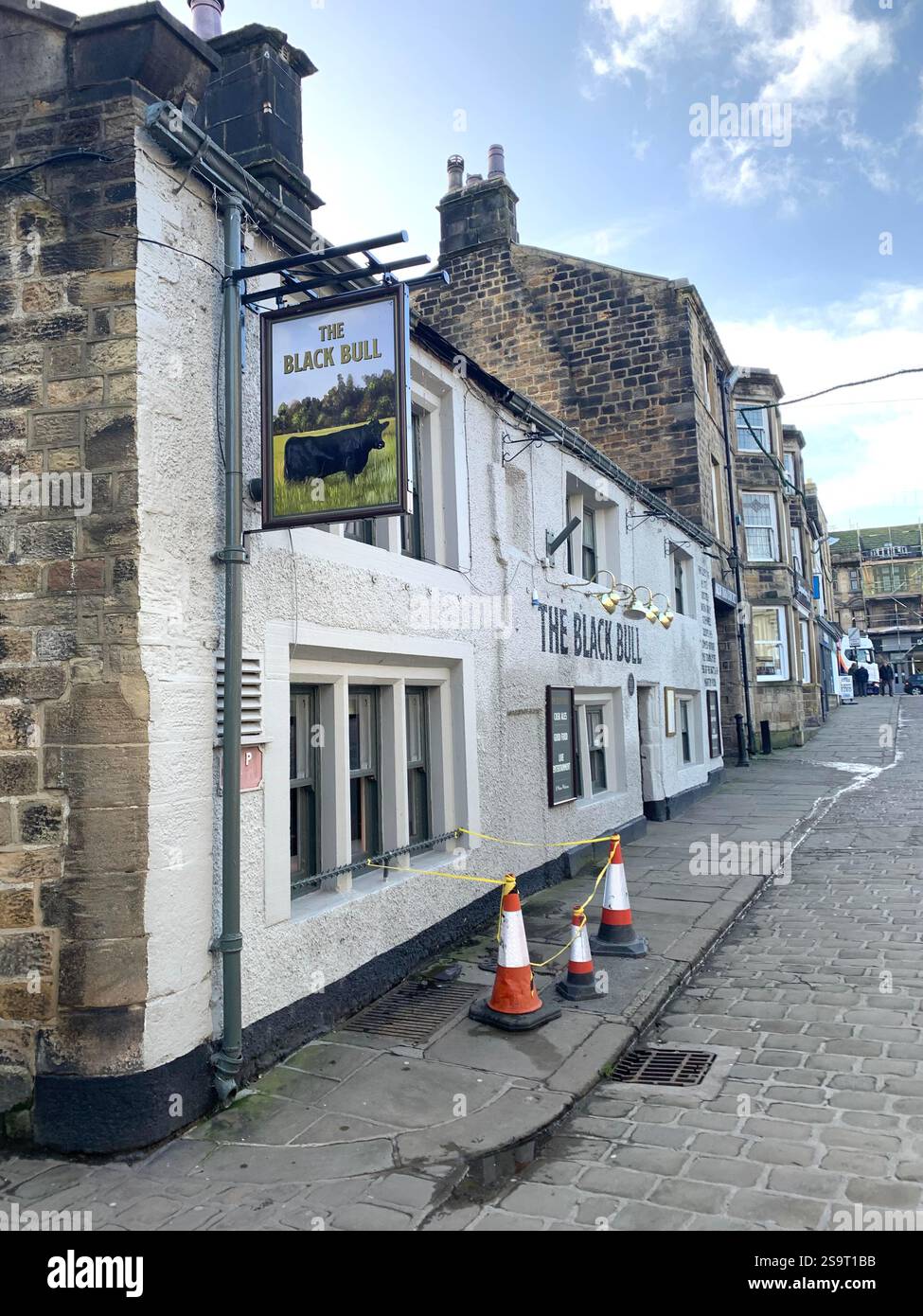 Otley Yorkshire town village place town street streets sign signs shop shops shopping shoppers life living  local pub Cromwell army history life - Smartphone Captured Stock Image