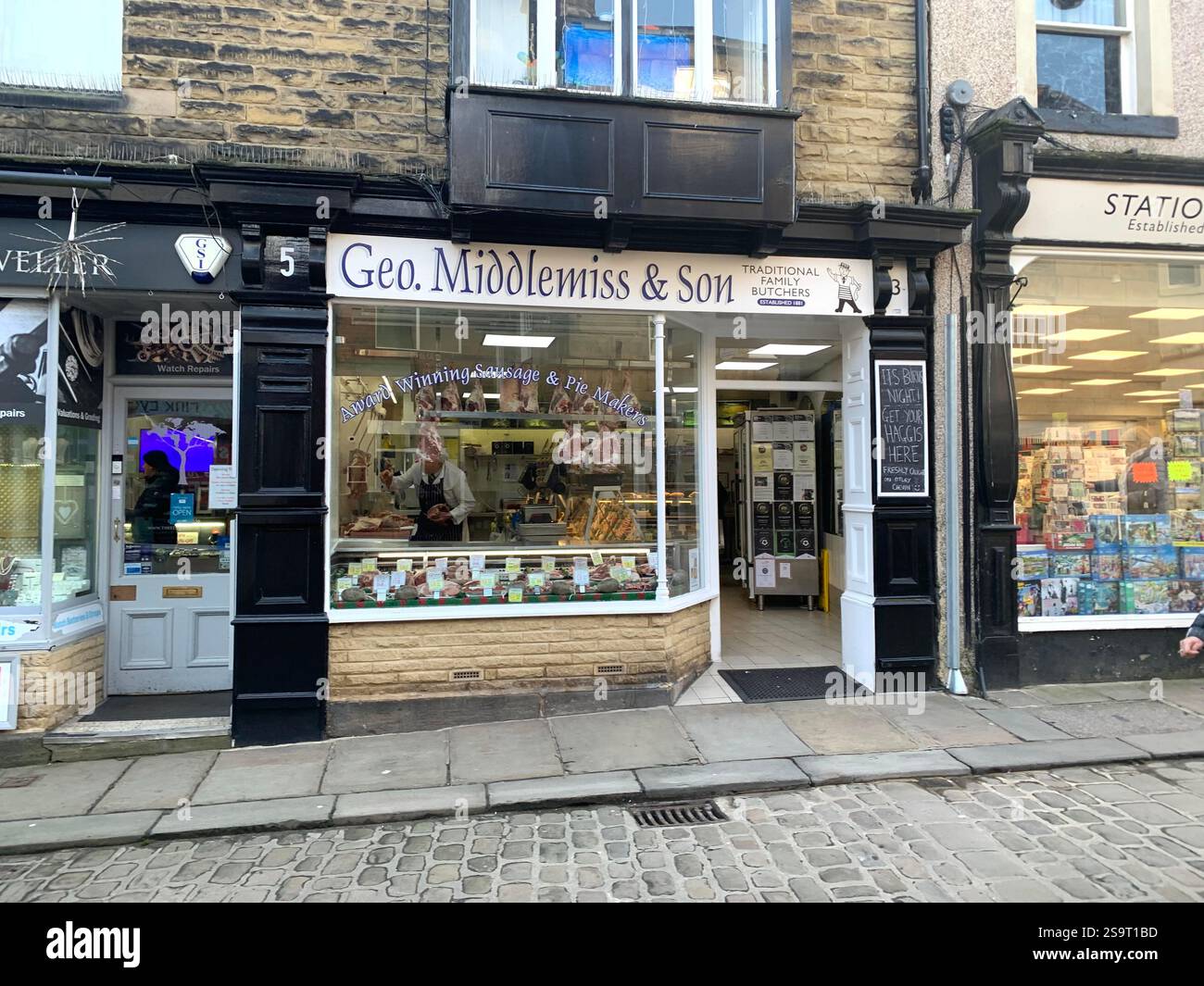 Otley Yorkshire town village place town street streets sign signs shop shops shopping shoppers life living  local pub Cromwell army history life - Smartphone Captured Stock Image