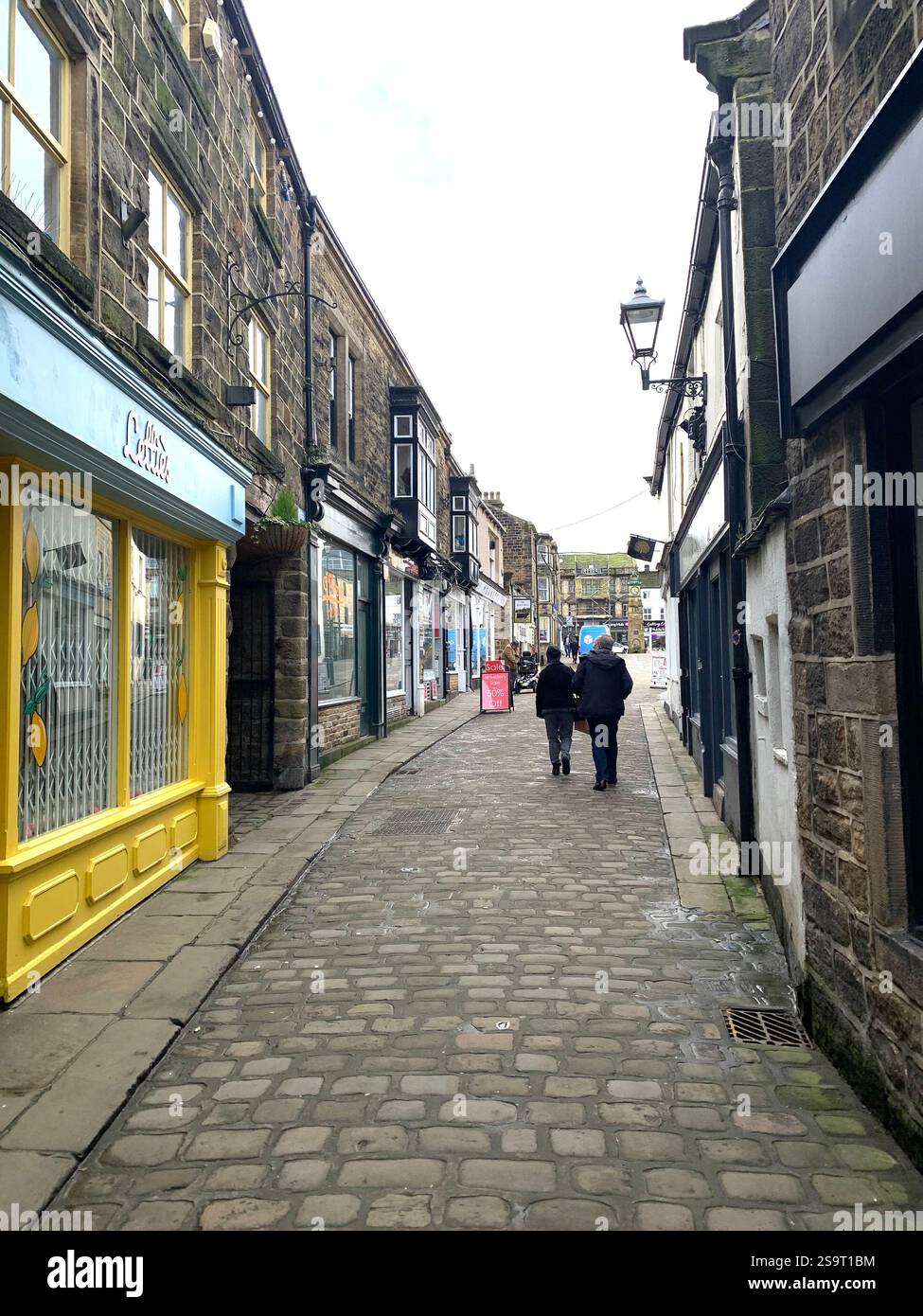 Otley Yorkshire town village place town street streets sign signs shop shops shopping shoppers life living  local pub Cromwell army history life - Smartphone Captured Stock Image