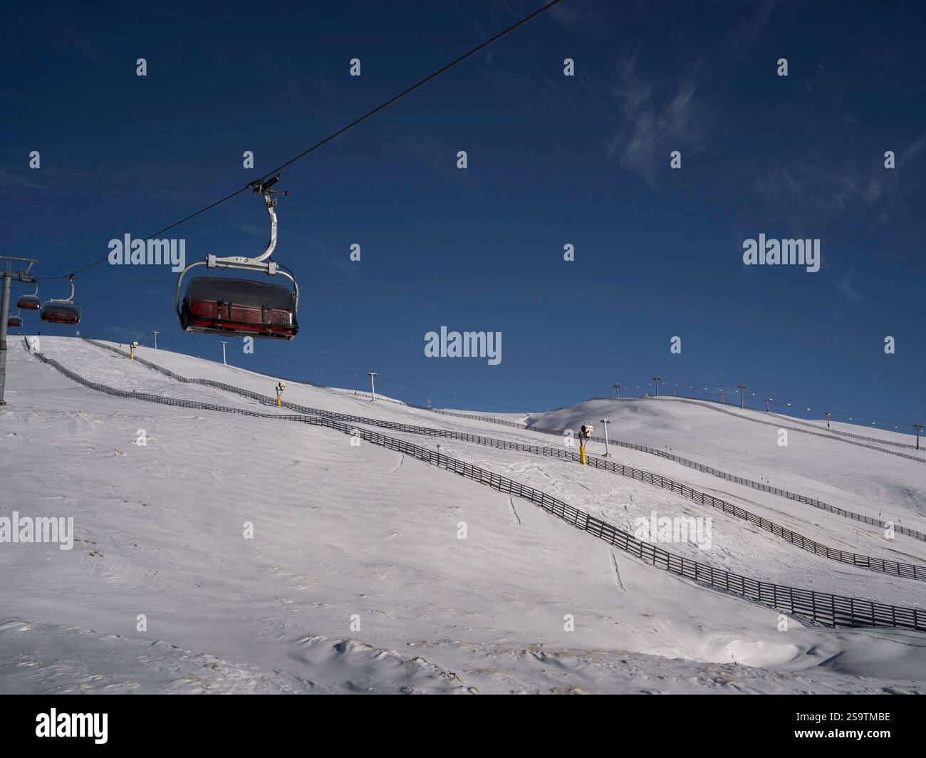 Sinaia Ski resort in the Bucegi mountains, with ski lifts and beautiful slopes. Stock Photo