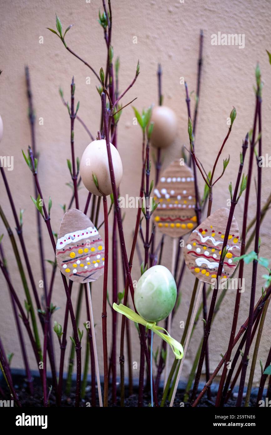 Easter Egg Decorations on Budding Branches Stock Photo