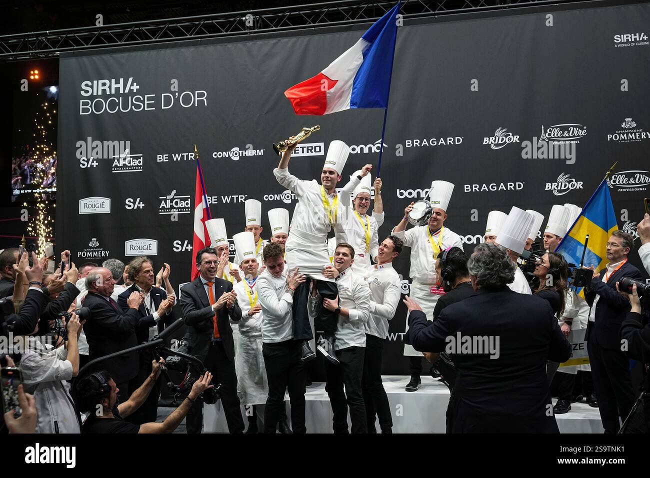 French chef Paul Marcon, center, celebrates with his teammates after
