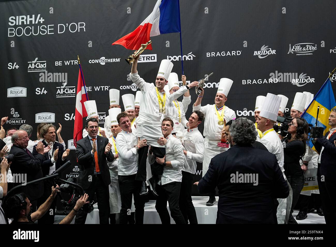 French chef Paul Marcon, center, celebrates with his teammates after