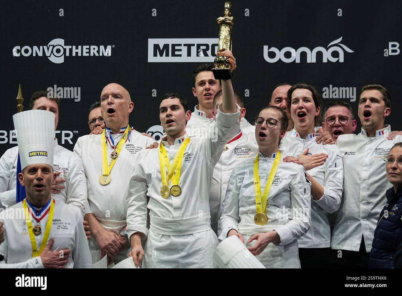 French chef Paul Marcon, center, celebrates with his teammates after