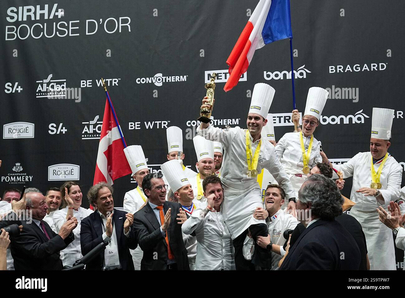 French chef Paul Marcon, center, celebrates with his teammates after