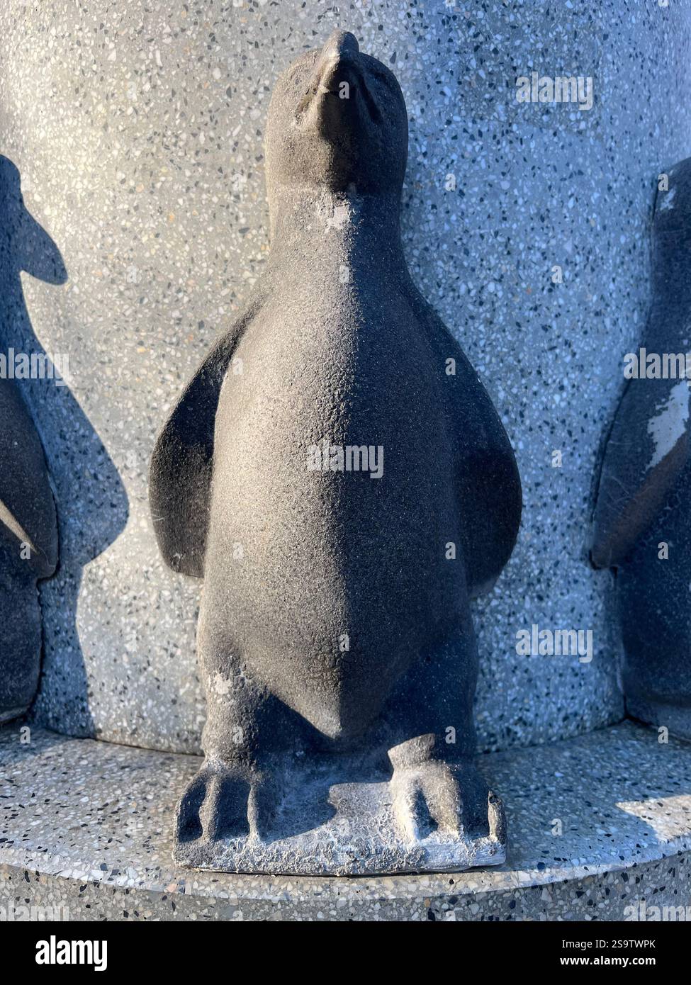 penguin, art, stone penguin, urban, public park, drinking fountain, penguin statue, outdoor decor, decorative penguin, water feature decor - Smartphone Captured Stock Image