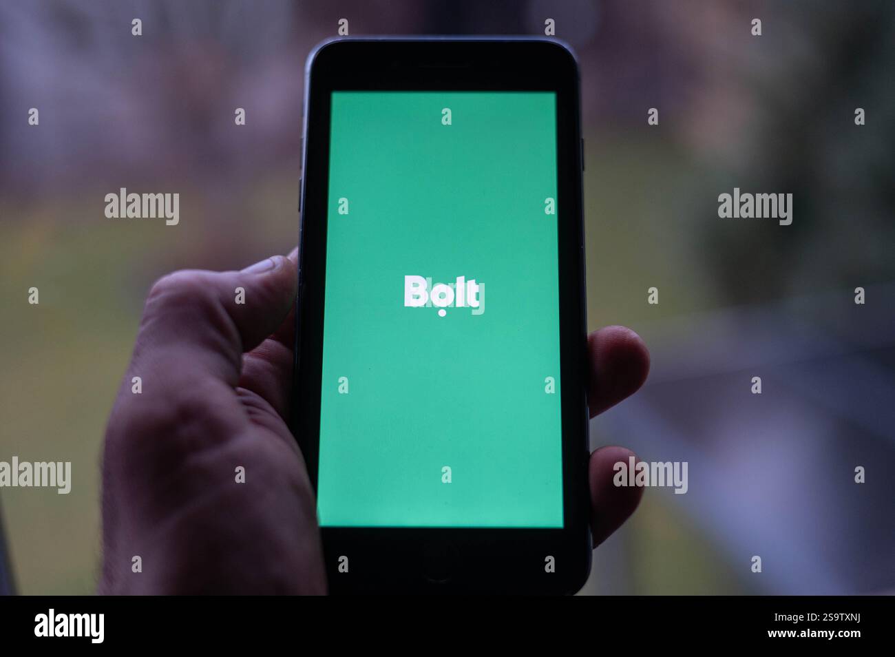 A person is opening Bolt ride app on a phone Stock Photo - Alamy
