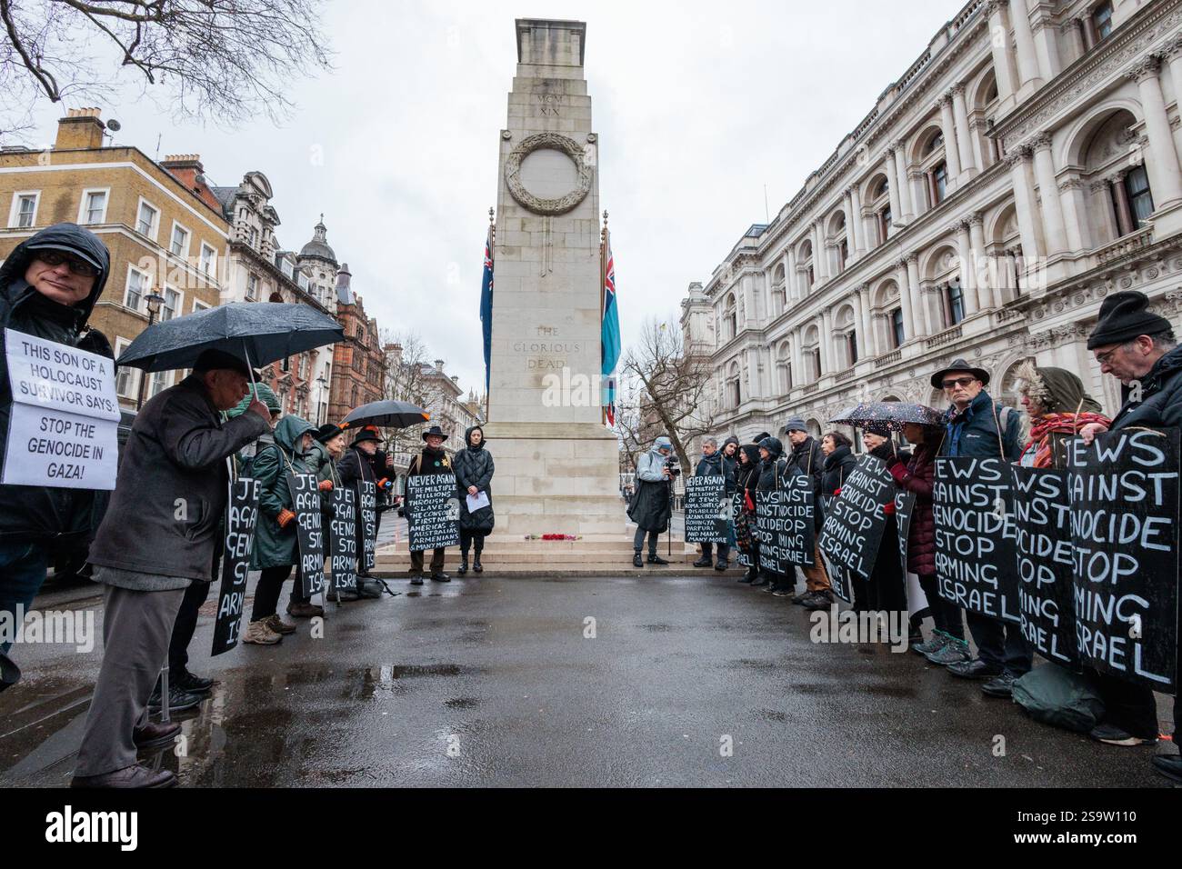 London, UK. 27th January, 2025. Supporters of Jews Against Genocide, including Holocaust survivor Stephen Kapos and descendants, attend an alternative Holocaust Memorial Day ceremony at the Cenotaph. The event, a solemn and respectful ceremony including Jewish and Muslim prayers for the dead, poems, the laying of wreaths and a 3-minute silence, called attention to the recent 'Palestinian genocide' and other historic genocides, as well as to the Holocaust. Credit: Mark Kerrison/Alamy Live News Stock Photo