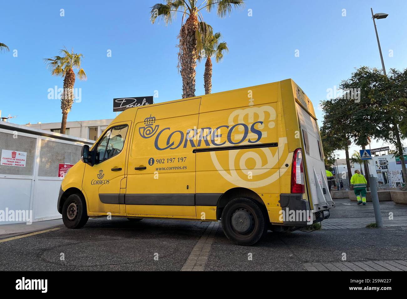 Yellow Correos Mail Van parked in Playa de las Américas. Arona, Tenerife. Canary Islands, Spain. 15th January 2025. - Smartphone Captured Stock Image
