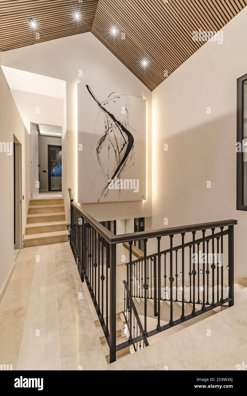 a portrait image of a newly refurbished staircase and roof in ...