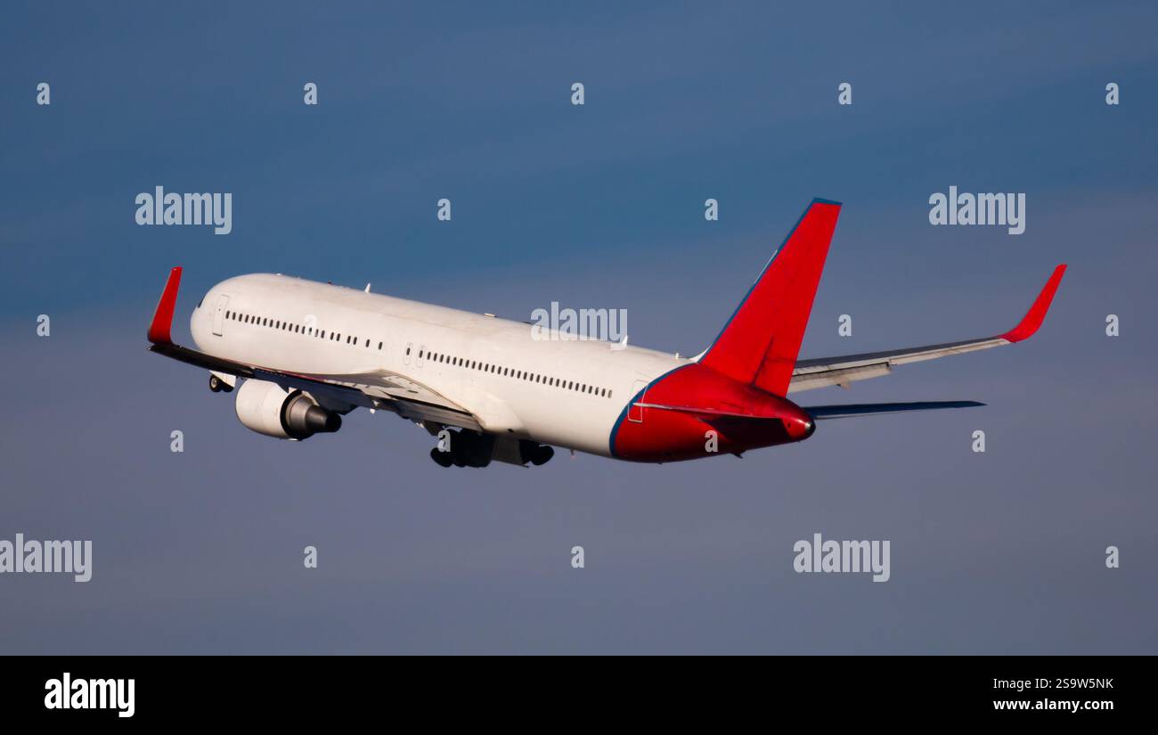 Airplane takes off from airport Stock Photo - Alamy