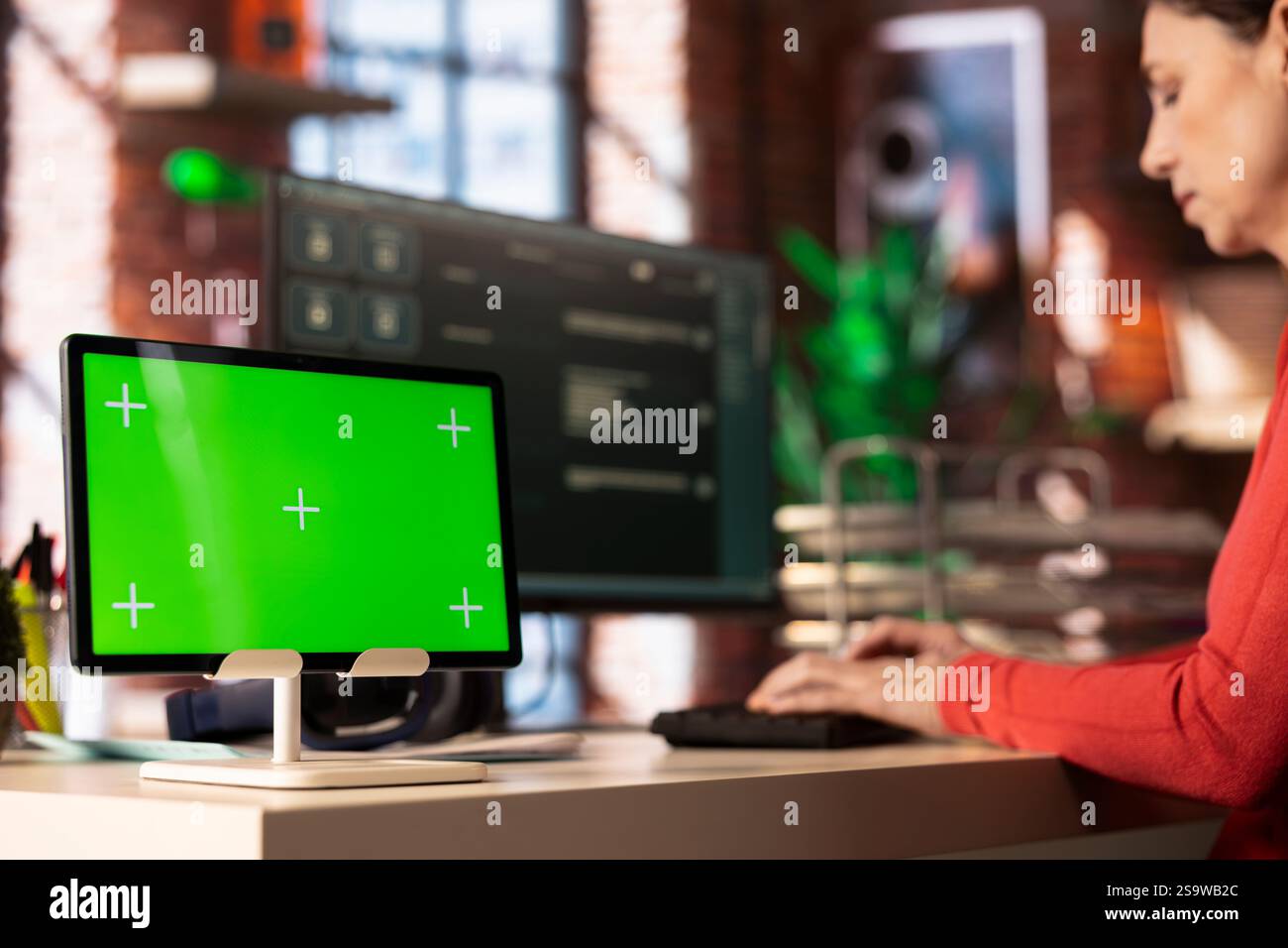 Female freelancer interacting with an AI chatbot next to isolated copy space, smart web software showcases cutting edge artificial intelligence for efficient real time solutions and problem solving. Stock Photo