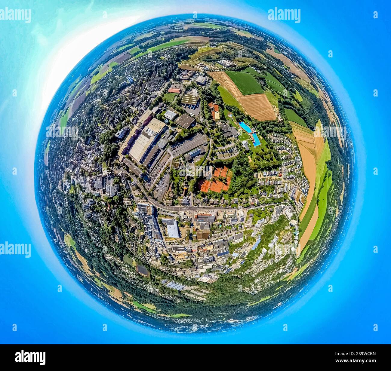 Aerial view outdoor and indoor swimming pool Heljensbad tennis courts