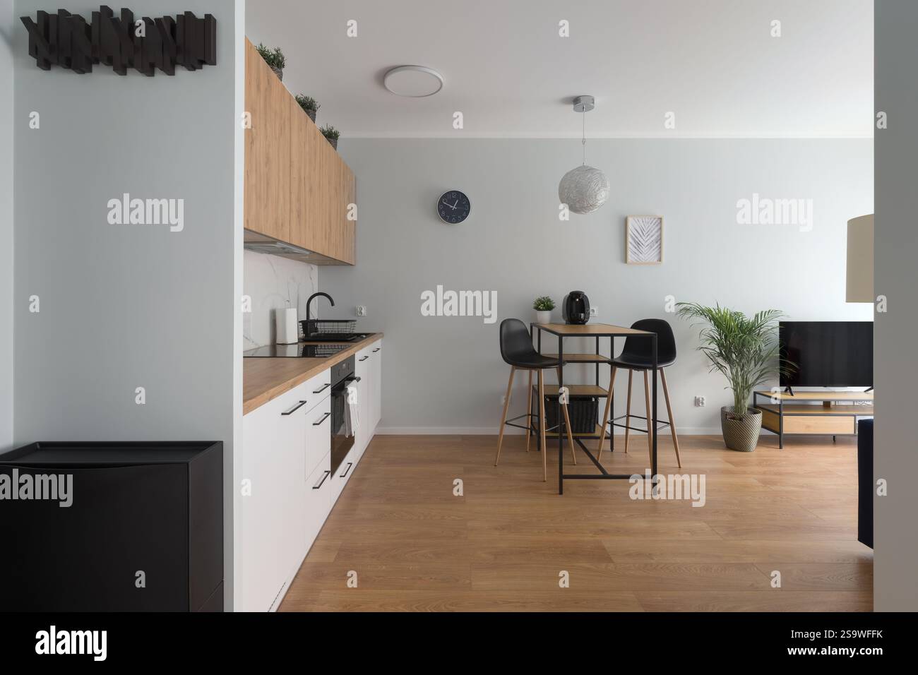 Open Concept Living Space with Kitchen and Dining Area Stock Photo - Alamy