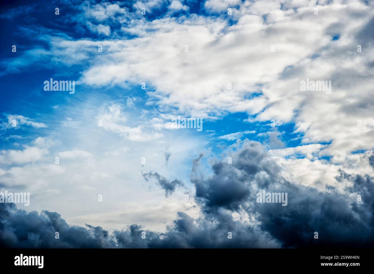 Dramatic storm cloudscape with strange cloud shapes Stock Photo