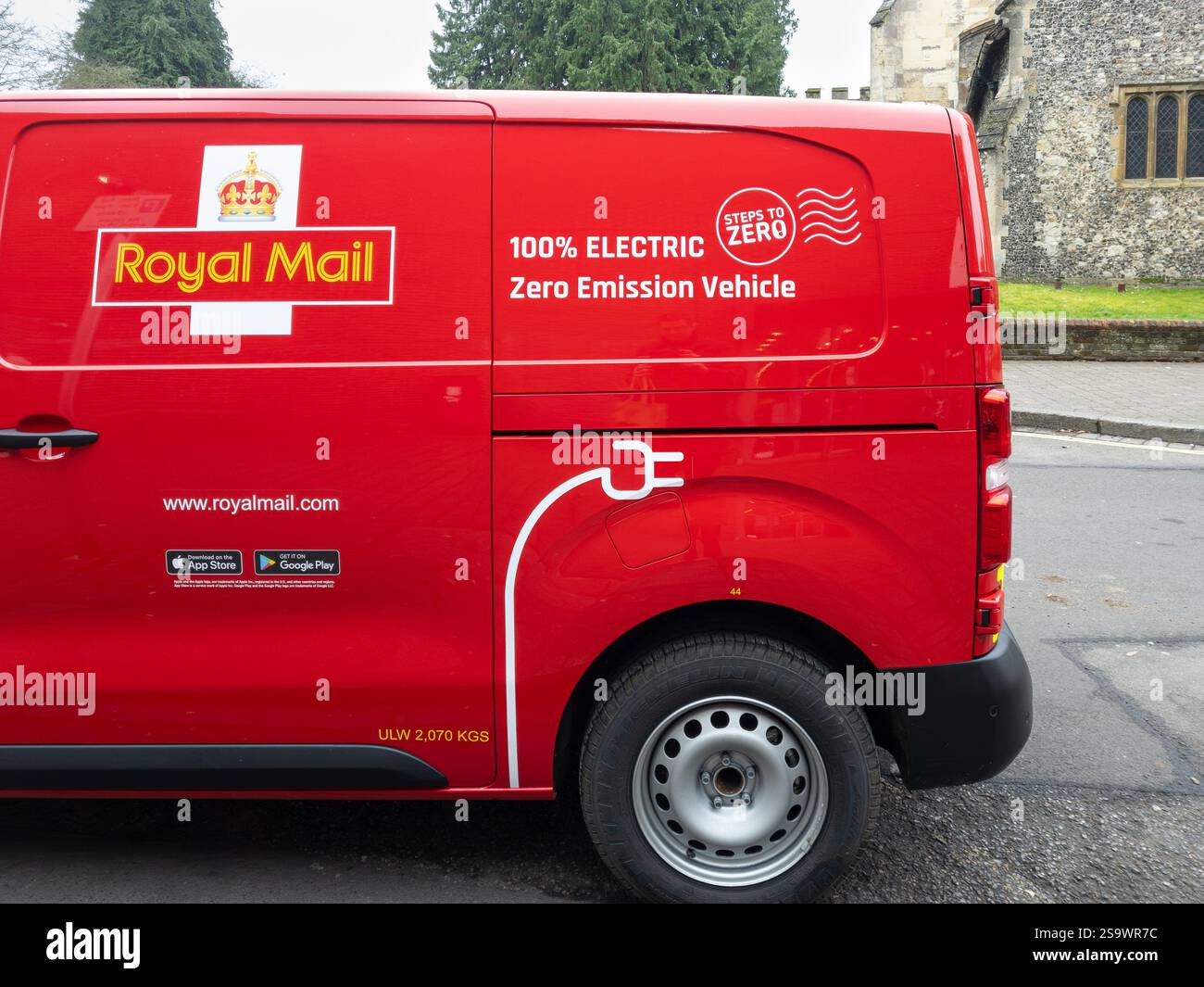 100% electric zero emissions vehicle - Royal Mail postal delivery van with Royal Mail livery and logo, Basingstoke, England. Concept: carbon reduction - Smartphone Captured Stock Image