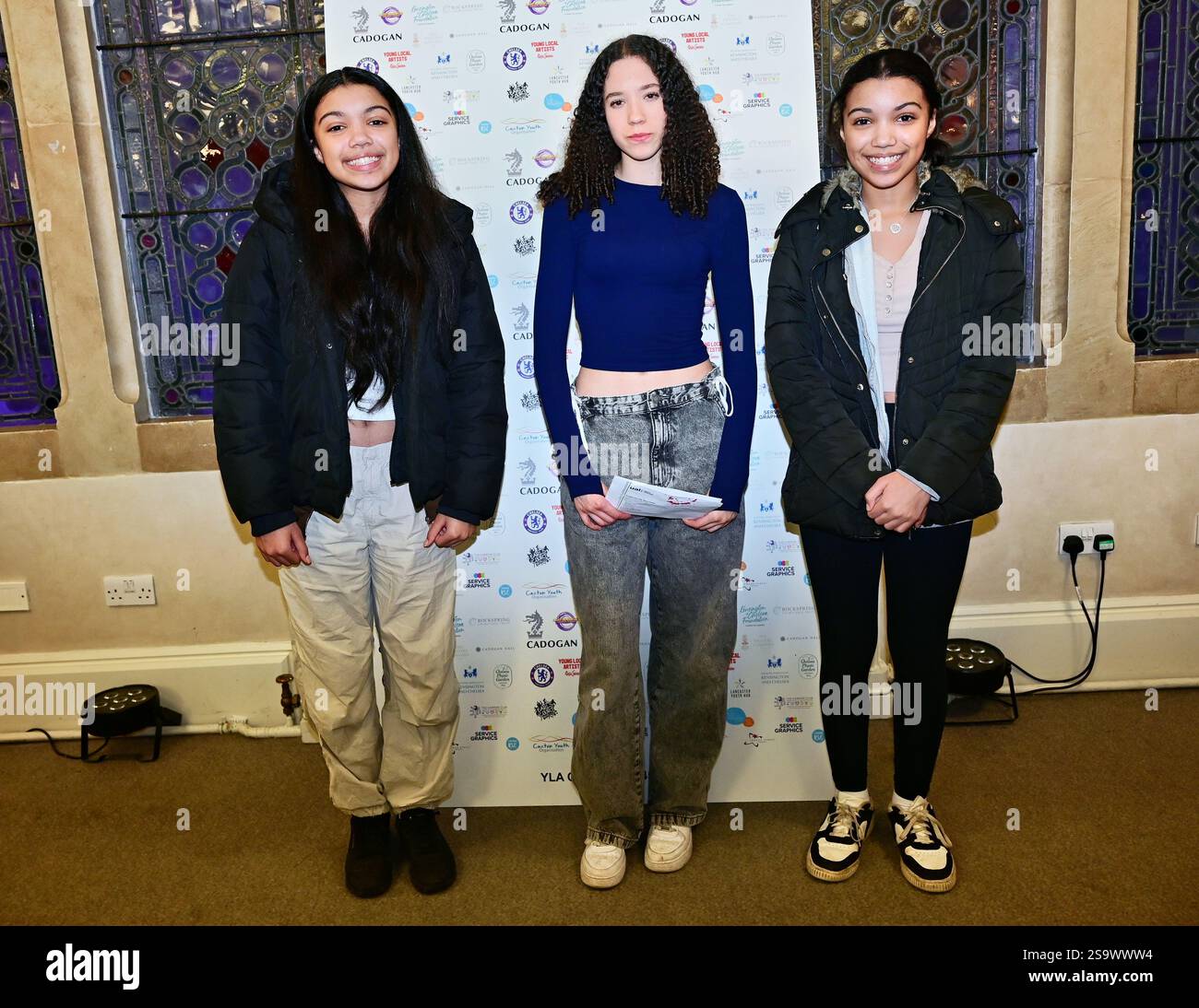 LONDON, UK. 26th Jan, 2025. Photographer Sky age 15 win a award with the two twin models at the A Day in Your Life Awards held by 'Day in Your Life' is a community-minded project at Cadogan Hall, in London, England. (Photo by 李世惠/See Li/Picture Capital) Credit: See Li/Picture Capital/Alamy Live News Stock Photo