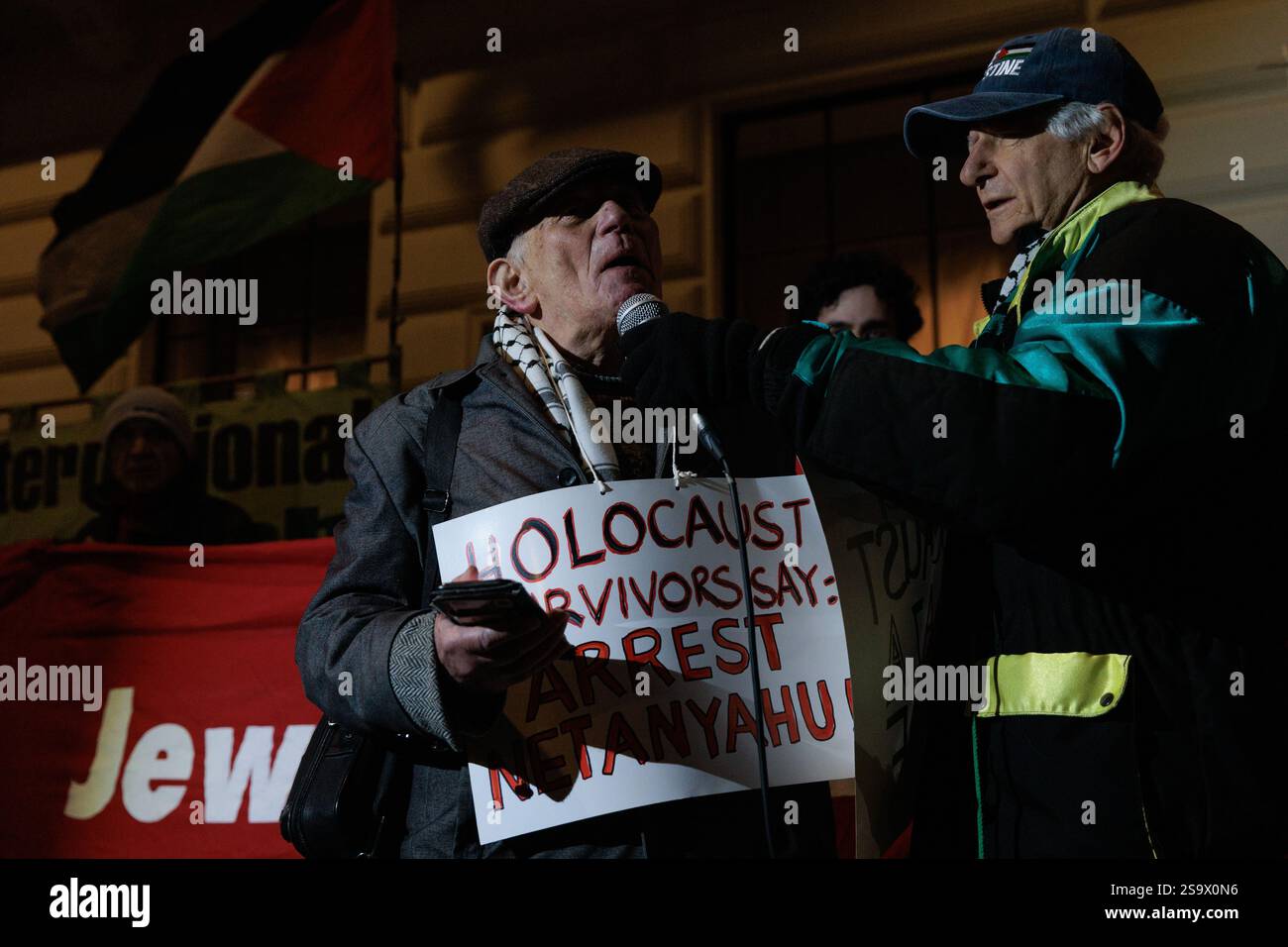 London, UK. 27th January, 2025. Holocaust survivor Stephen Kapos (l), 87, addresses activists from the International Jewish Anti-Zionist Network and supporters during a protest outside the Polish embassy against assurances made by Polish President Andrzej Duda that the Israeli Prime Minister Benjamin Netanyahu would not have faced arrest under an International Criminal Court warrant for crimes against humanity had he attended the Auschwitz memorial on Holocaust Memorial Day. Credit: Mark Kerrison/Alamy Live News Stock Photo