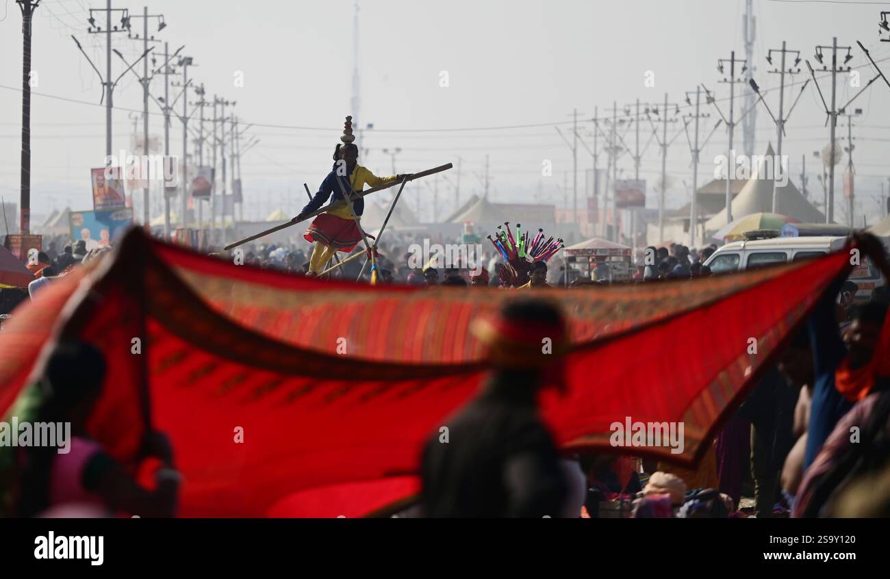 PRAYAGRAJ, INDIA JANUARY 27 Girl balancing on the rope during the