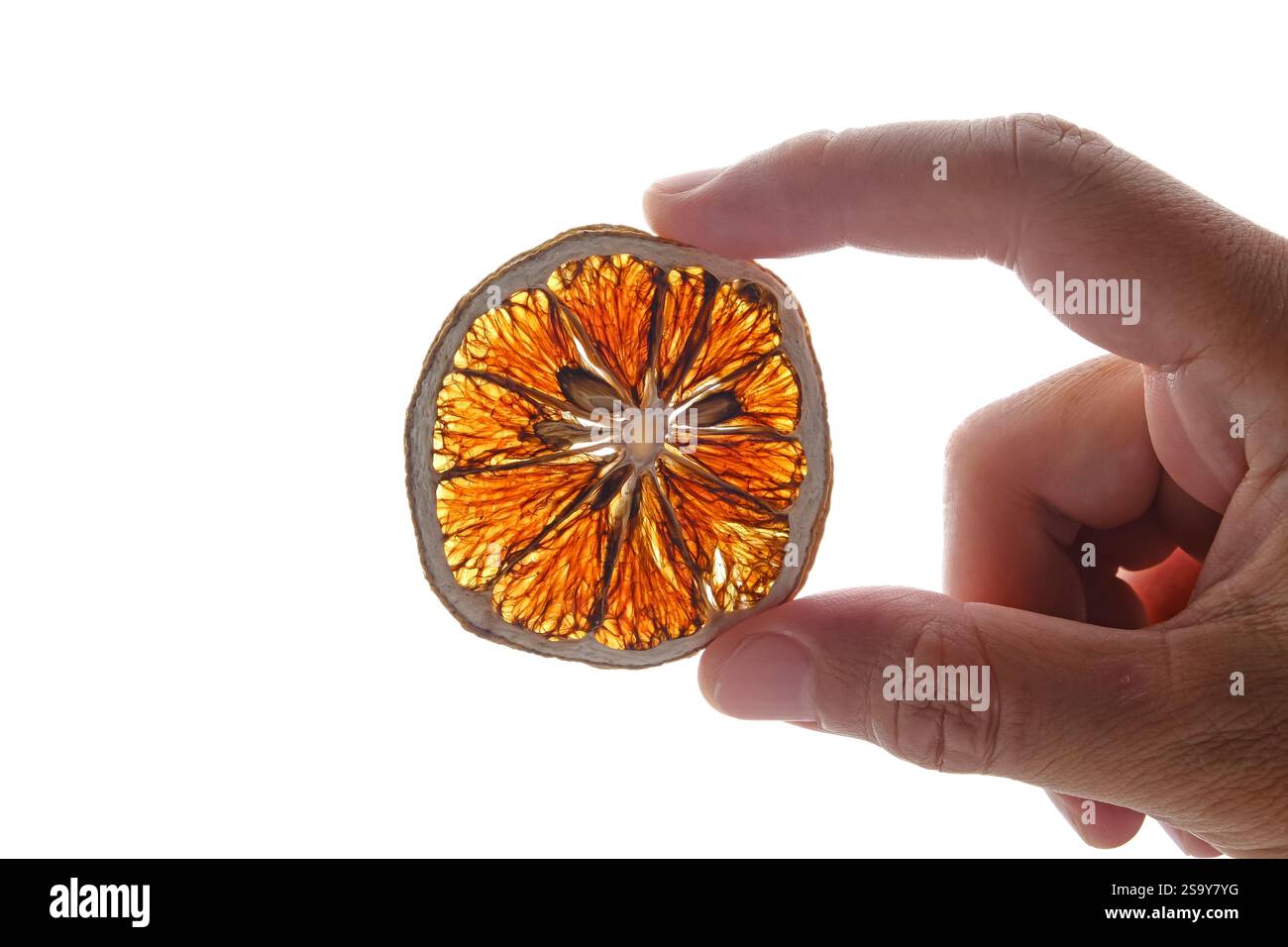 Dried orange slices on white background Stock Photo