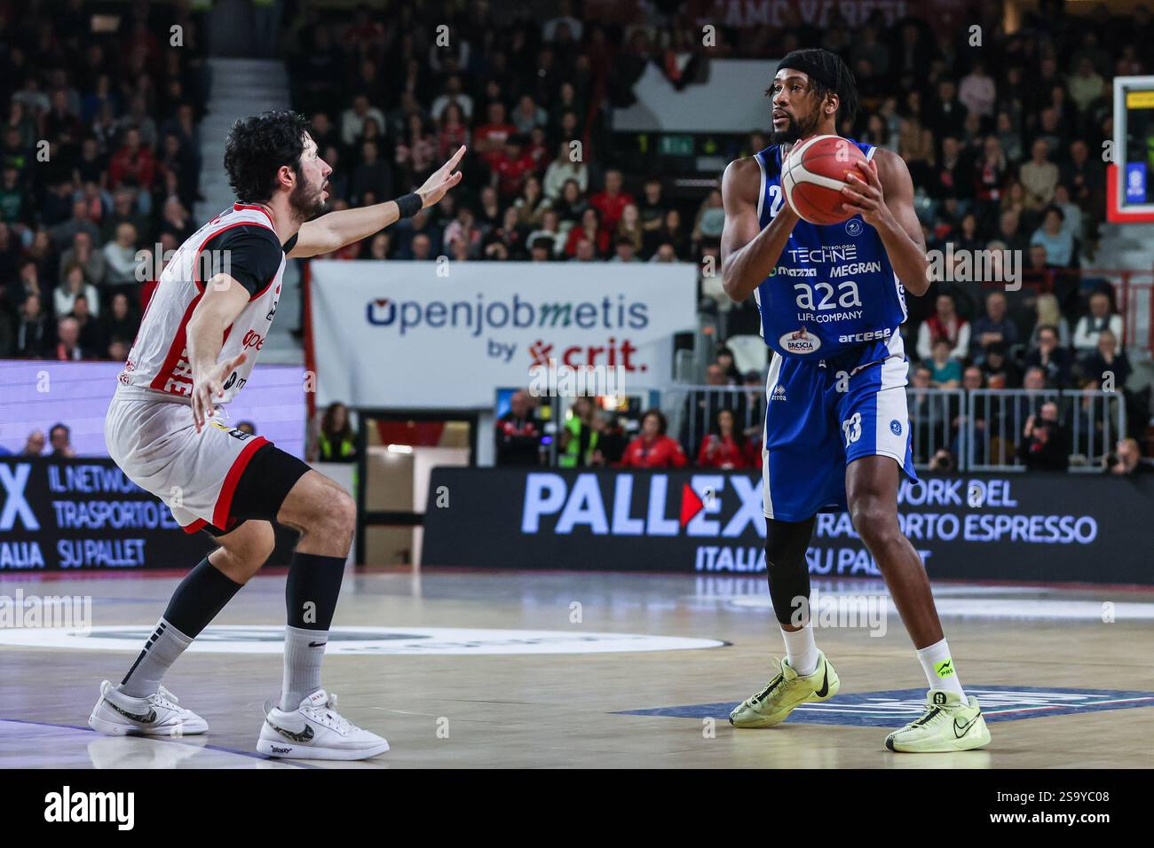 (R-L) Demetre Rivers #23 of Germani Brescia and Davide Alviti #2 of ...