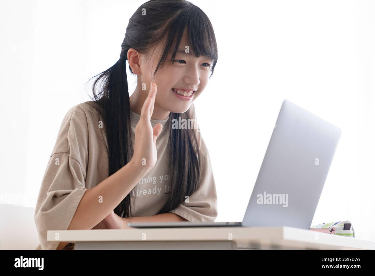 Junior high school students studying at home Stock Photo - Alamy