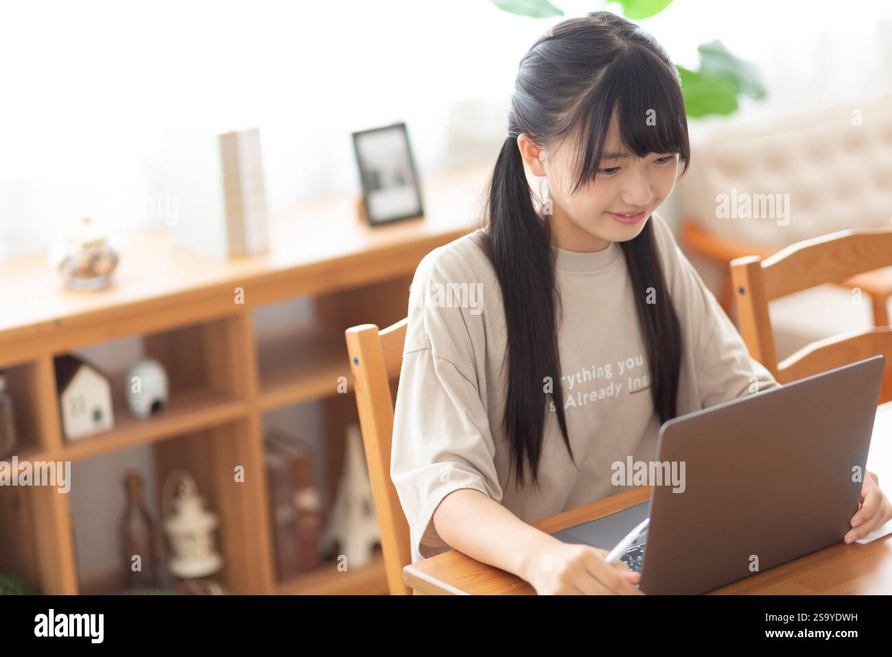 Junior high school students studying at home Stock Photo - Alamy