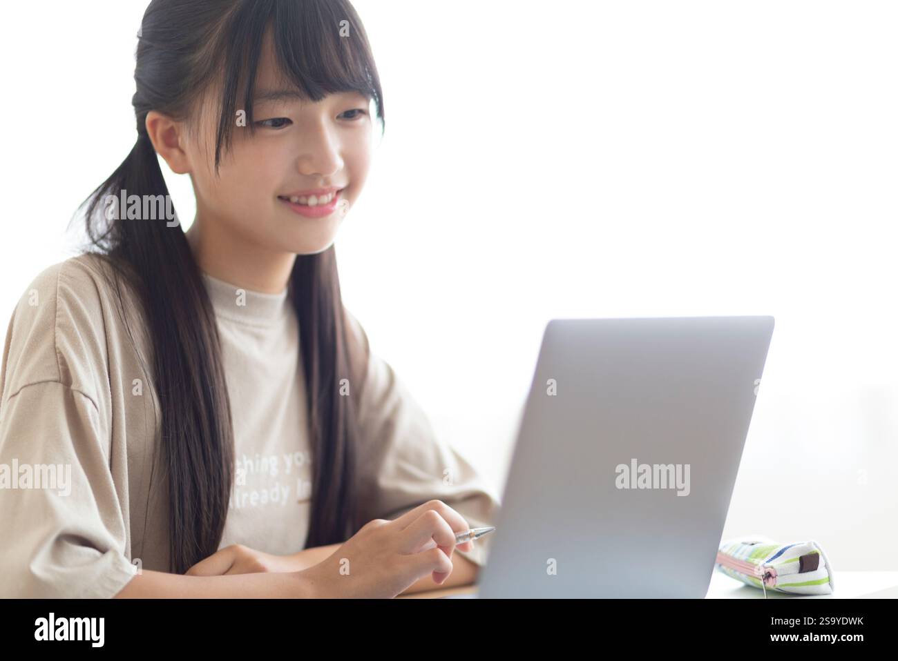 Junior high school students studying at home Stock Photo - Alamy