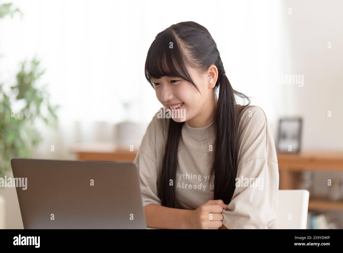 Junior high school students studying at home Stock Photo - Alamy