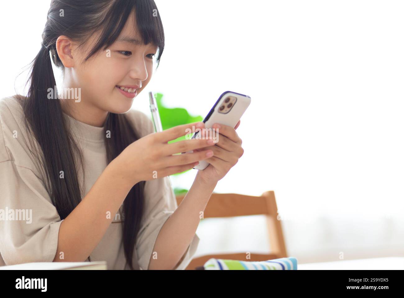 Junior high school students studying at home Stock Photo - Alamy