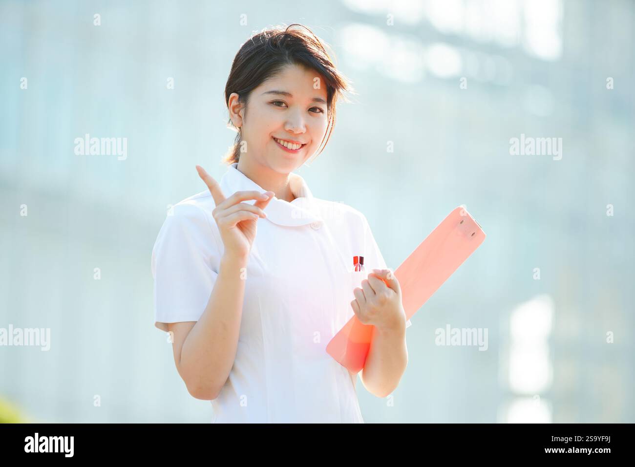 Woman massage finger smile hi-res stock photography and images - Alamy