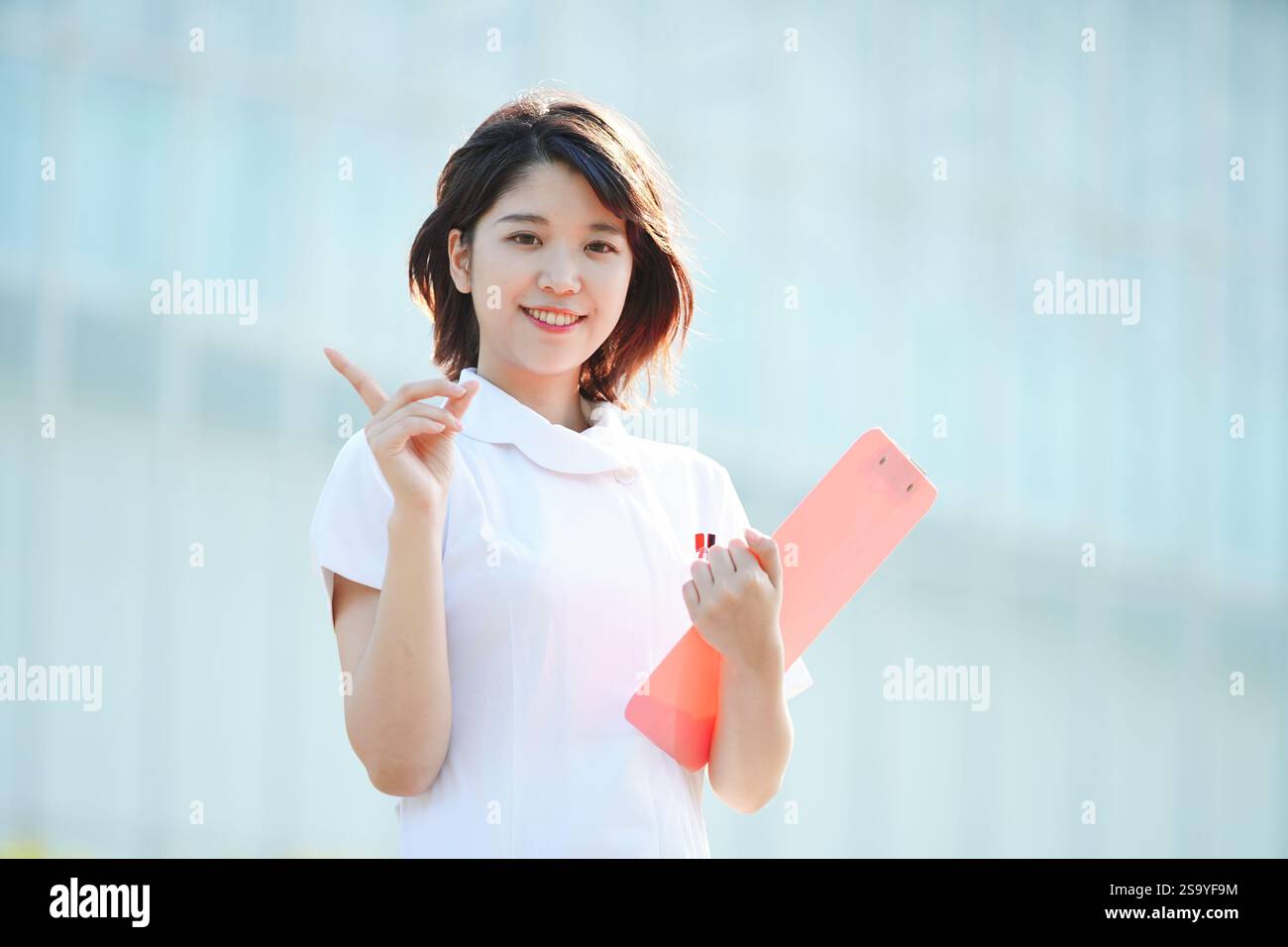 Woman massage finger smile hi-res stock photography and images - Alamy