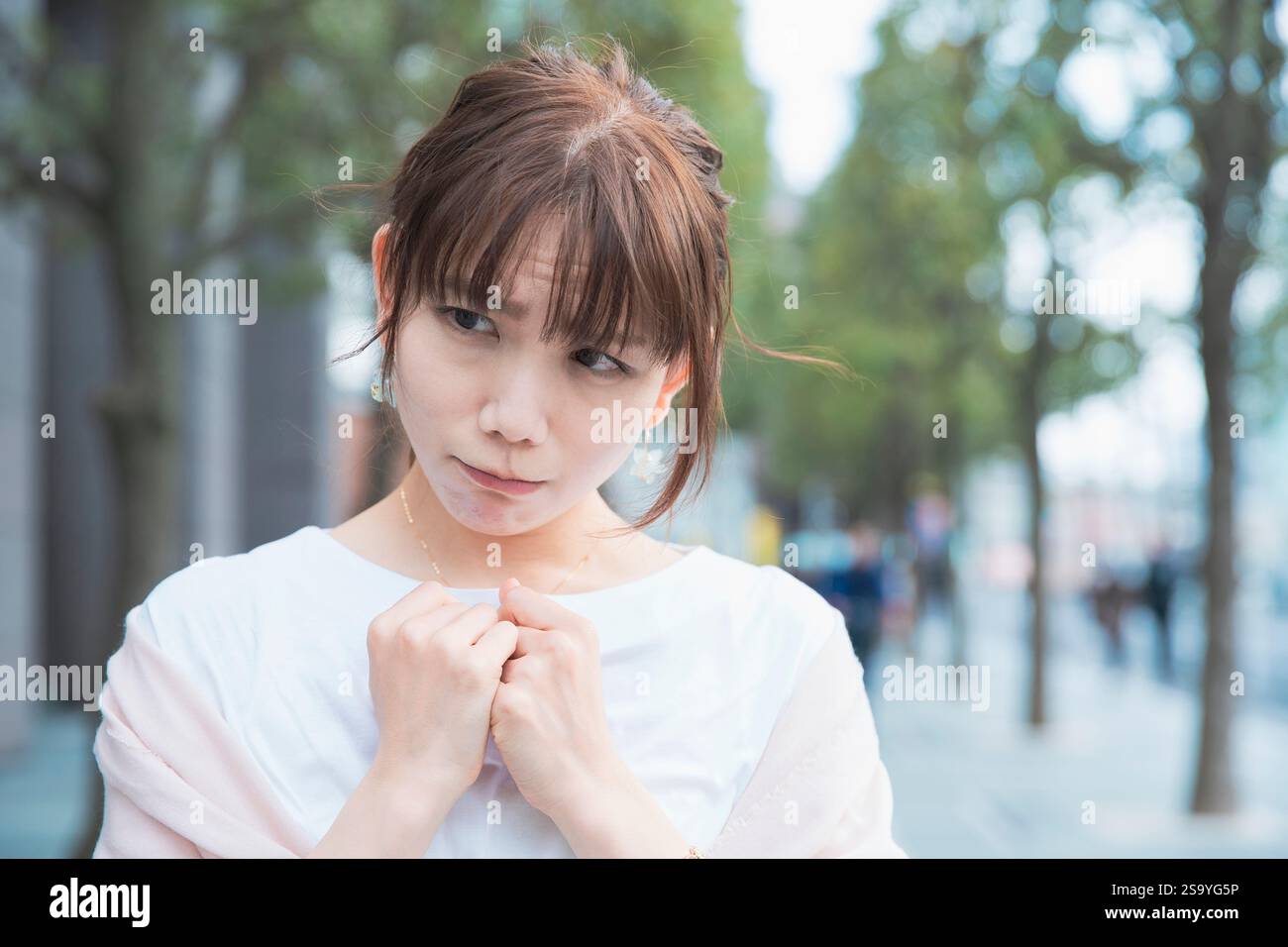 Woman looking shocked and sad Stock Photo - Alamy