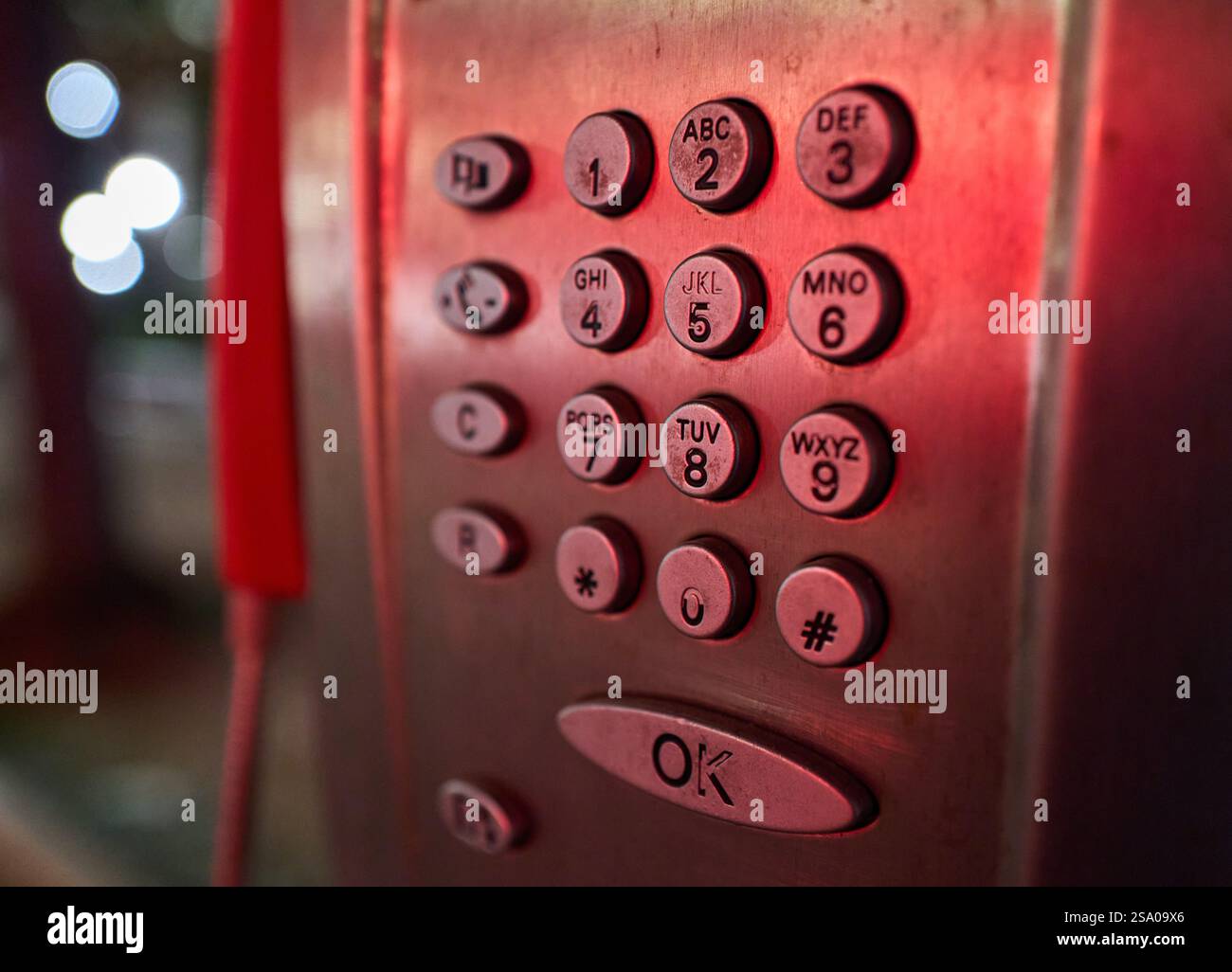 Close-Up of Telecom Italia Public Phone Keypad: A Glimpse into Italy’s Communication History Stock Photo