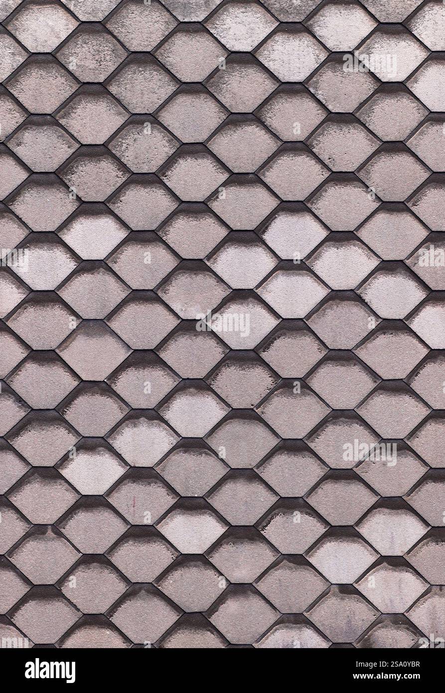 Grey concrete hexagonal pavement creating repeating pattern Stock Photo