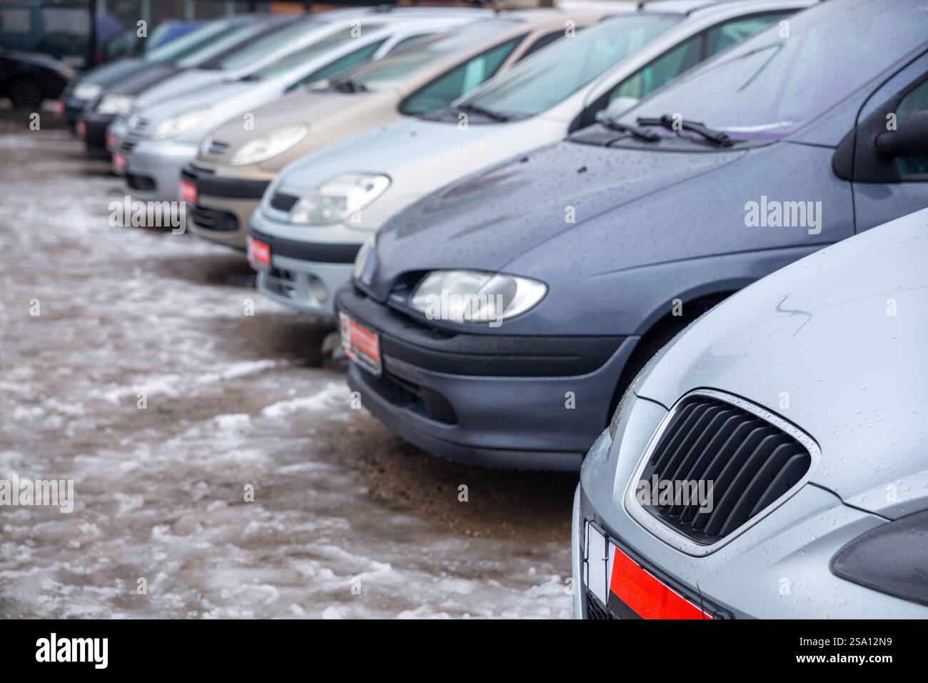 An area with used cars for sale. The buyer can inspect the car from the ...