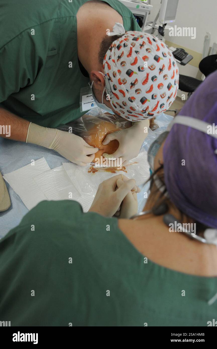 Morphine injection into a child's spine Stock Photo - Alamy