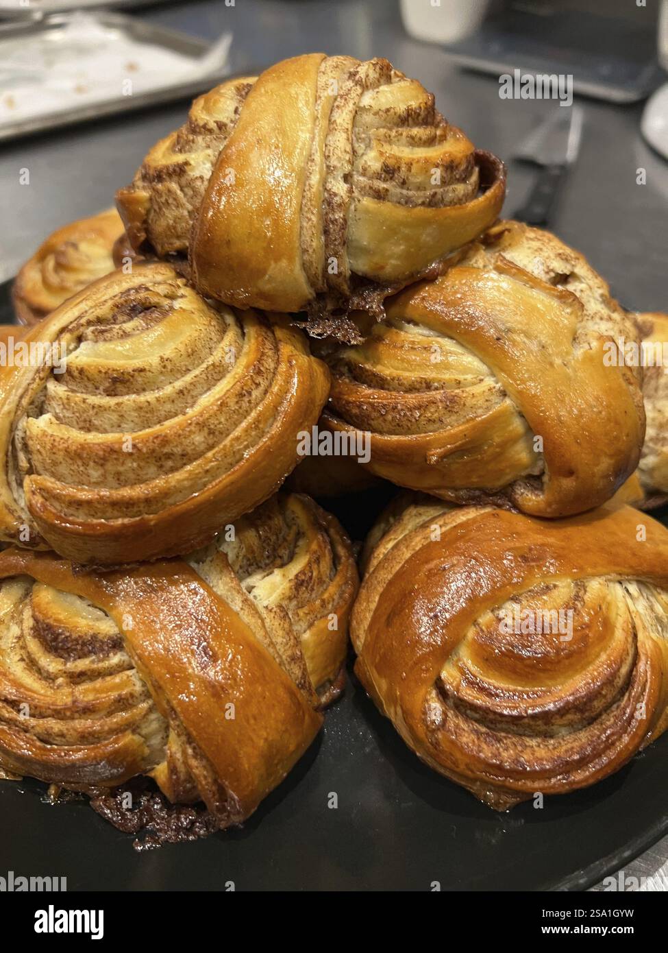 Freshly baked cinnamon buns, Vienna Austria Stock Photo