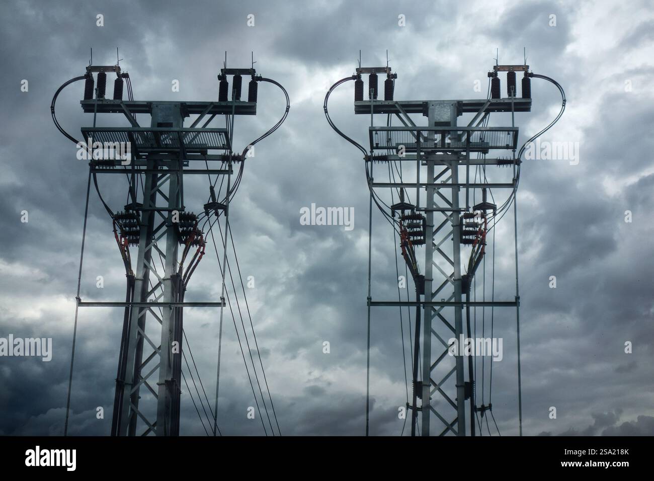 transmission towers silhouettes Stock Photo - Alamy