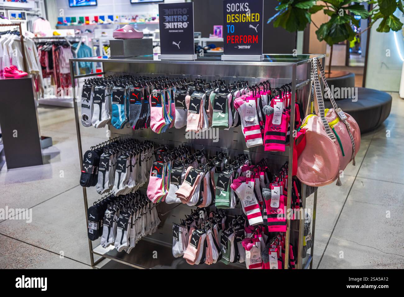 Puma shop interior sneakers display hi-res stock photography and