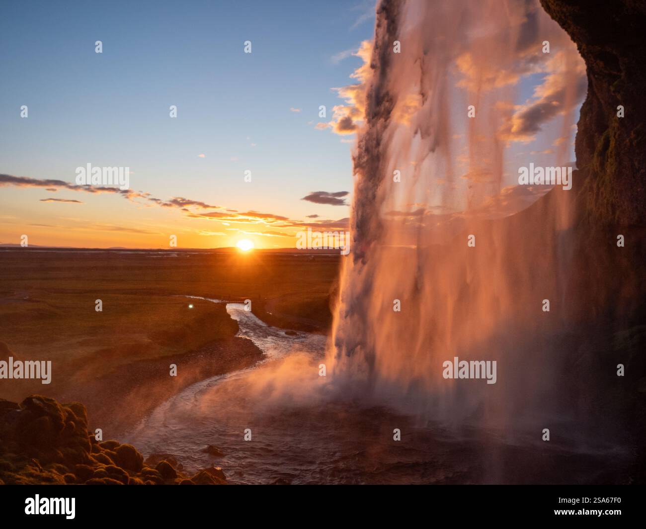 Iceland seljalandsfoss sunset waterfall mist hi-res stock photography ...