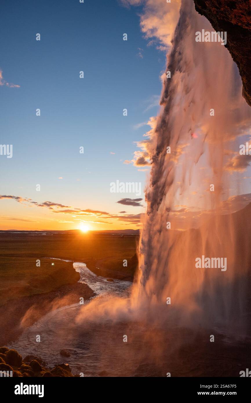 Iceland seljalandsfoss sunset waterfall mist hi-res stock photography ...