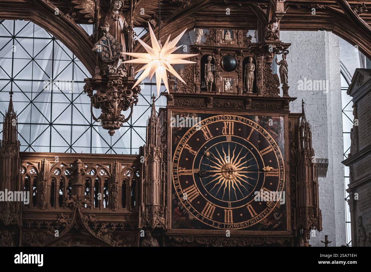 Historic clock at Lübeck Cathedral in Lübeck, Germany Stock Photo